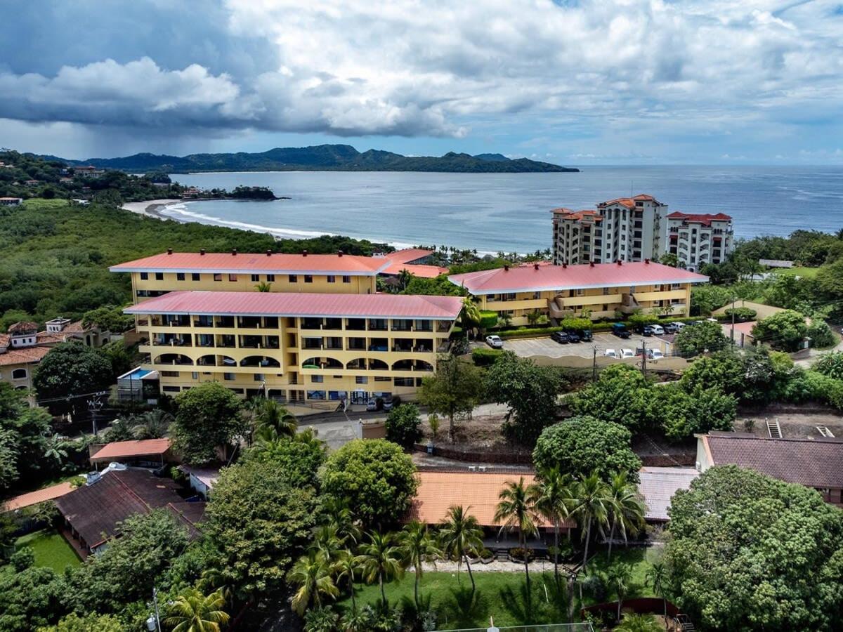Remodeled Top-Floor Condo with Stunning Wrap-Around Balcony Offering Mountain, Ocean & Marina Views