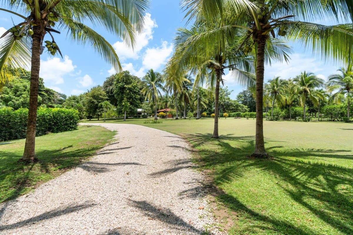 Stunning Gated Property with a Lush Garden, Wrap-Around Terrace & Private Pool