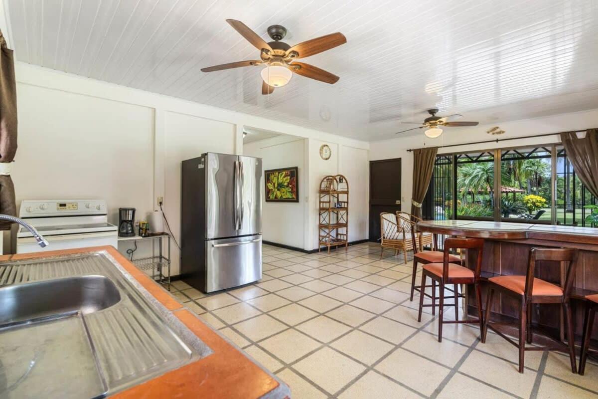 Stunning Gated Property with a Lush Garden, Wrap-Around Terrace & Private Pool