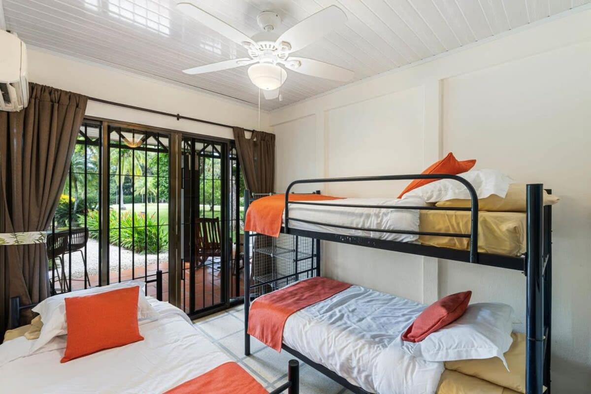 Stunning Gated Property with a Lush Garden, Wrap-Around Terrace & Private Pool