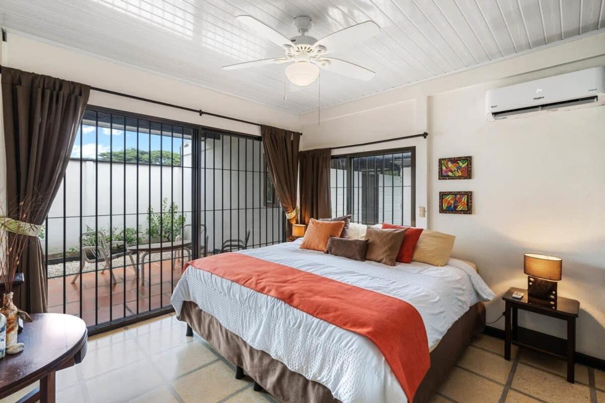 Stunning Gated Property with a Lush Garden, Wrap-Around Terrace & Private Pool
