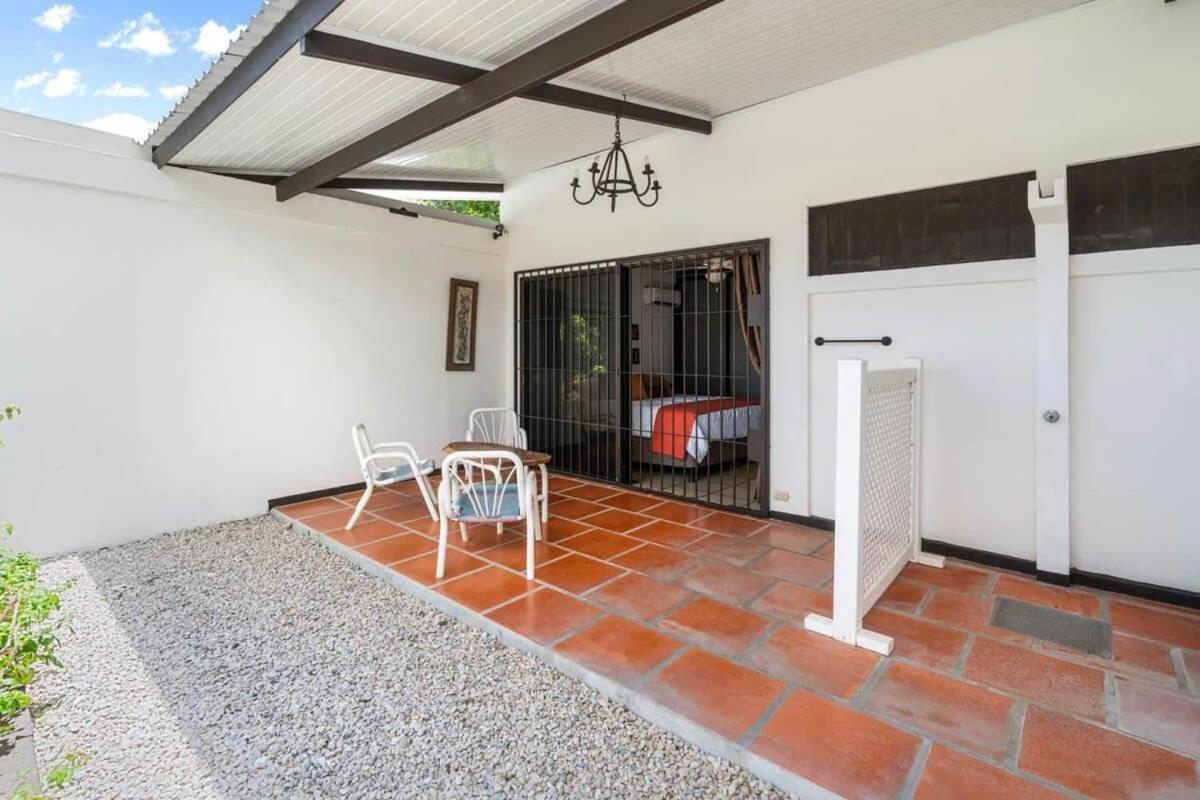 Stunning Gated Property with a Lush Garden, Wrap-Around Terrace & Private Pool