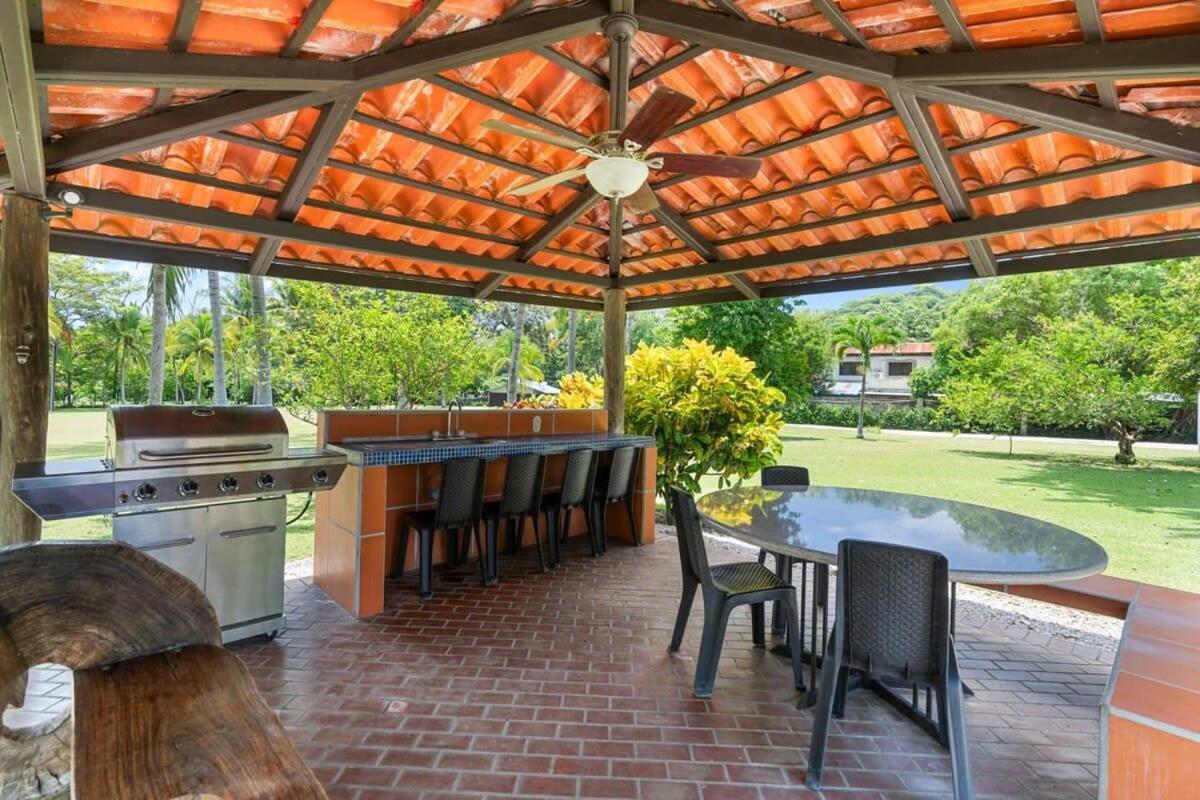Stunning Gated Property with a Lush Garden, Wrap-Around Terrace & Private Pool