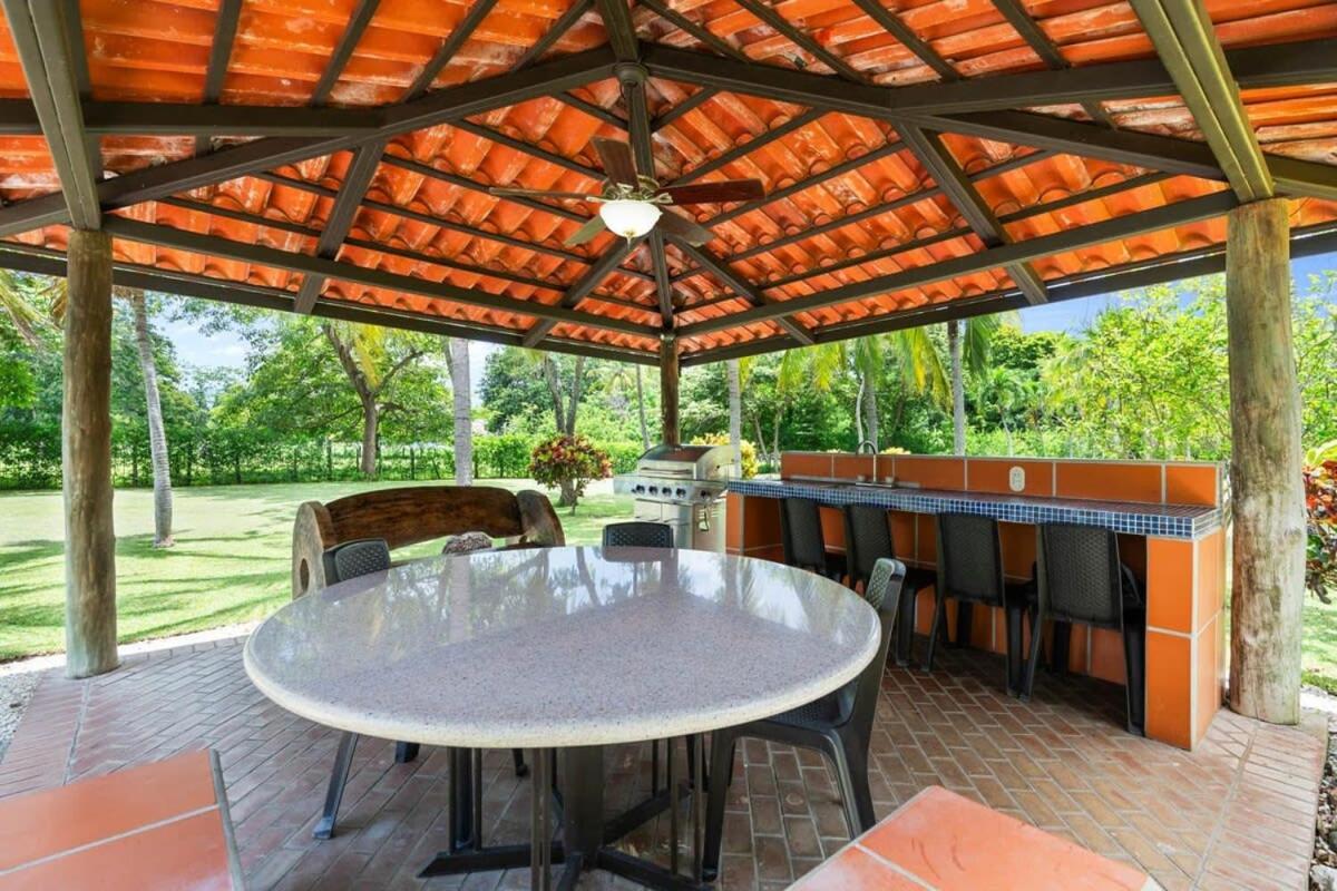 Stunning Gated Property with a Lush Garden, Wrap-Around Terrace & Private Pool