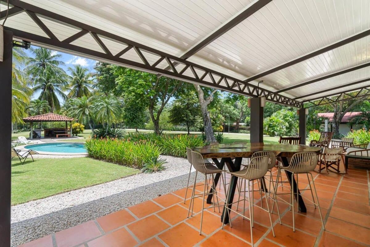 Stunning Gated Property with a Lush Garden, Wrap-Around Terrace & Private Pool