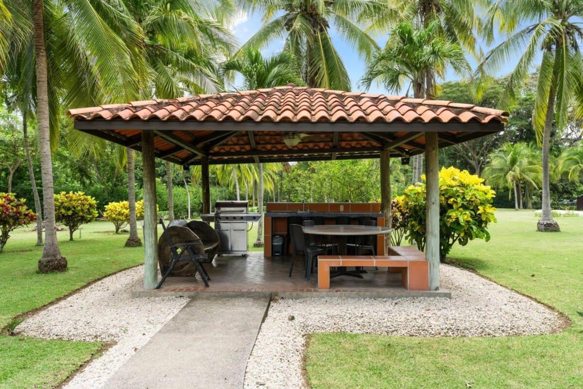 Stunning Gated Property with a Lush Garden, Wrap-Around Terrace & Private Pool