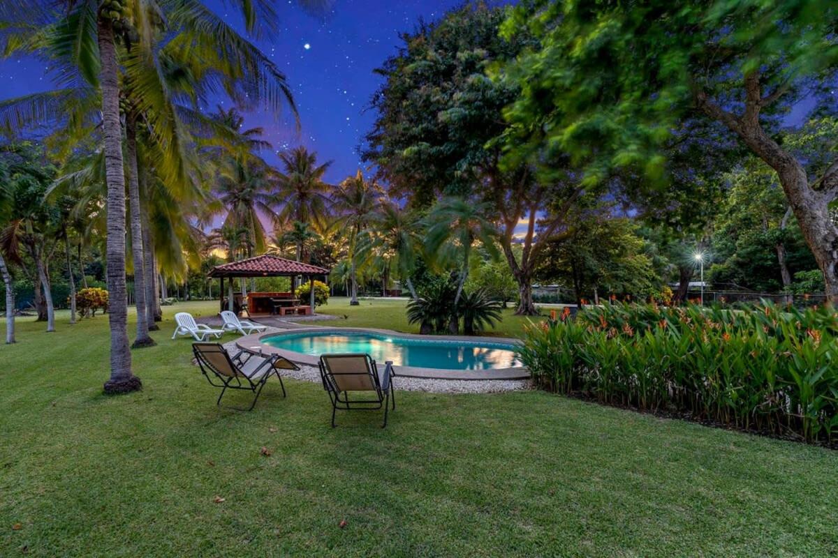 Stunning Gated Property with a Lush Garden, Wrap-Around Terrace & Private Pool