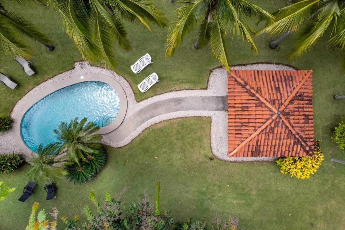 Stunning Gated Property with a Lush Garden, Wrap-Around Terrace & Private Pool