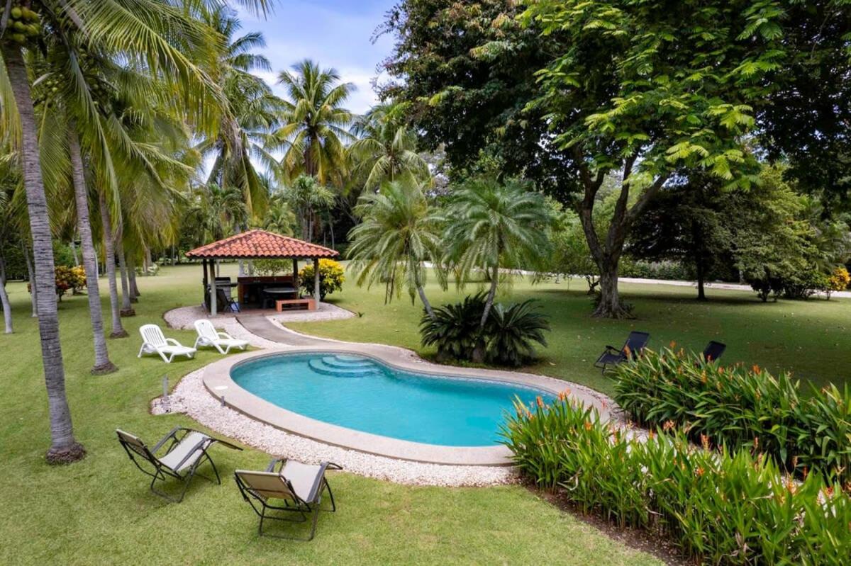 Stunning Gated Property with a Lush Garden, Wrap-Around Terrace & Private Pool