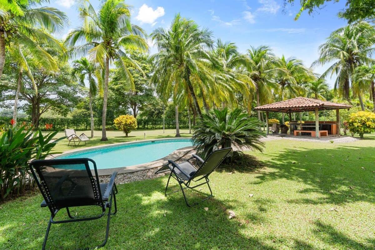 Stunning Gated Property with a Lush Garden, Wrap-Around Terrace & Private Pool
