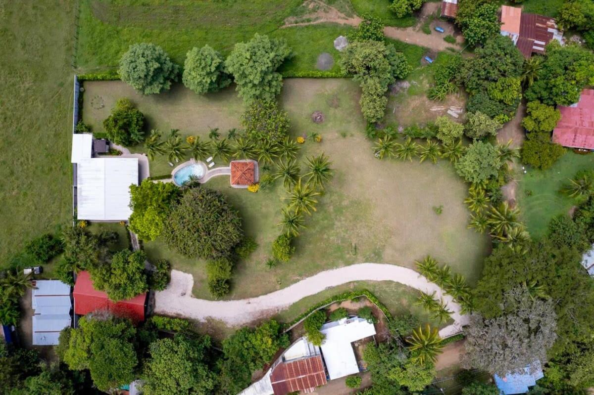 Stunning Gated Property with a Lush Garden, Wrap-Around Terrace & Private Pool