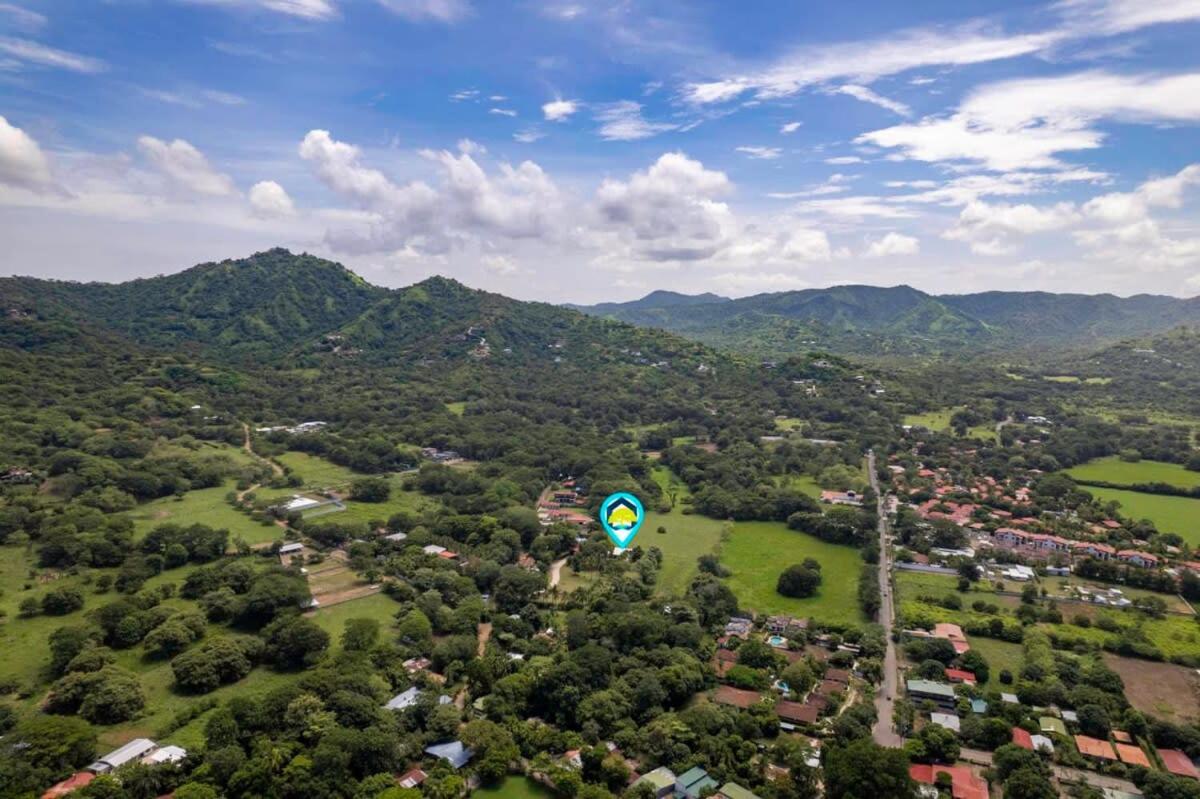 Stunning Gated Property with a Lush Garden, Wrap-Around Terrace & Private Pool