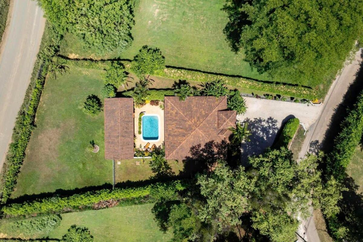 Stylish Home with Chic Decor, Luxury Amenities & Tropical Outdoor Oasis with Sparkling Private Pool