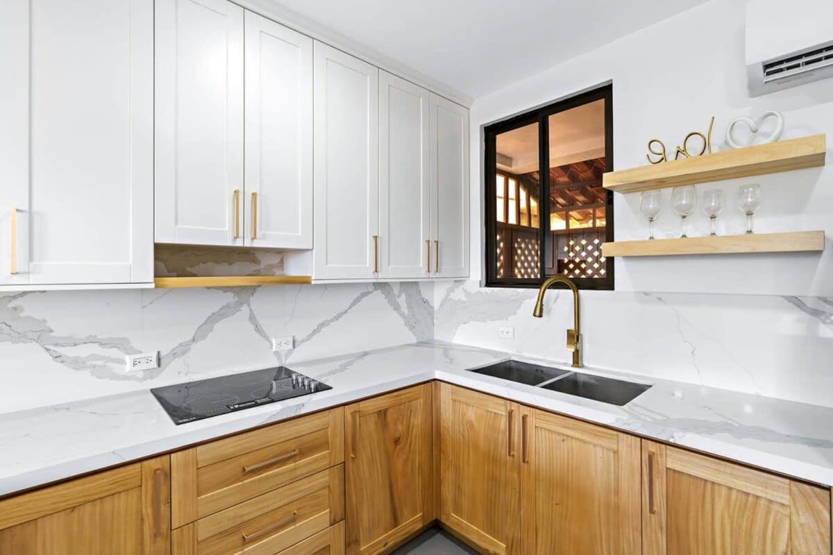Modern Split-Level 2-Bedroom Condo with Pools, Terrace & Easy Beach Access