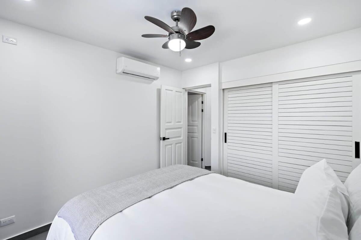 Modern Split-Level 2-Bedroom Condo with Pools, Terrace & Easy Beach Access