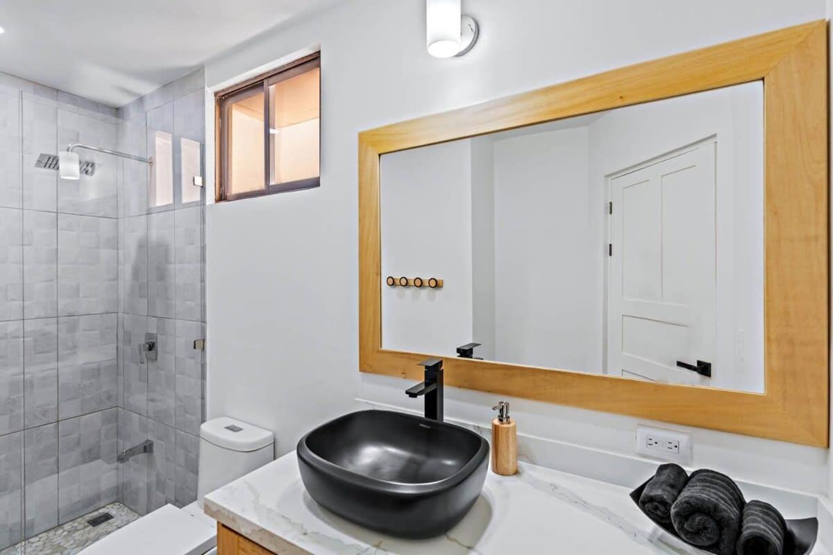 Modern Split-Level 2-Bedroom Condo with Pools, Terrace & Easy Beach Access