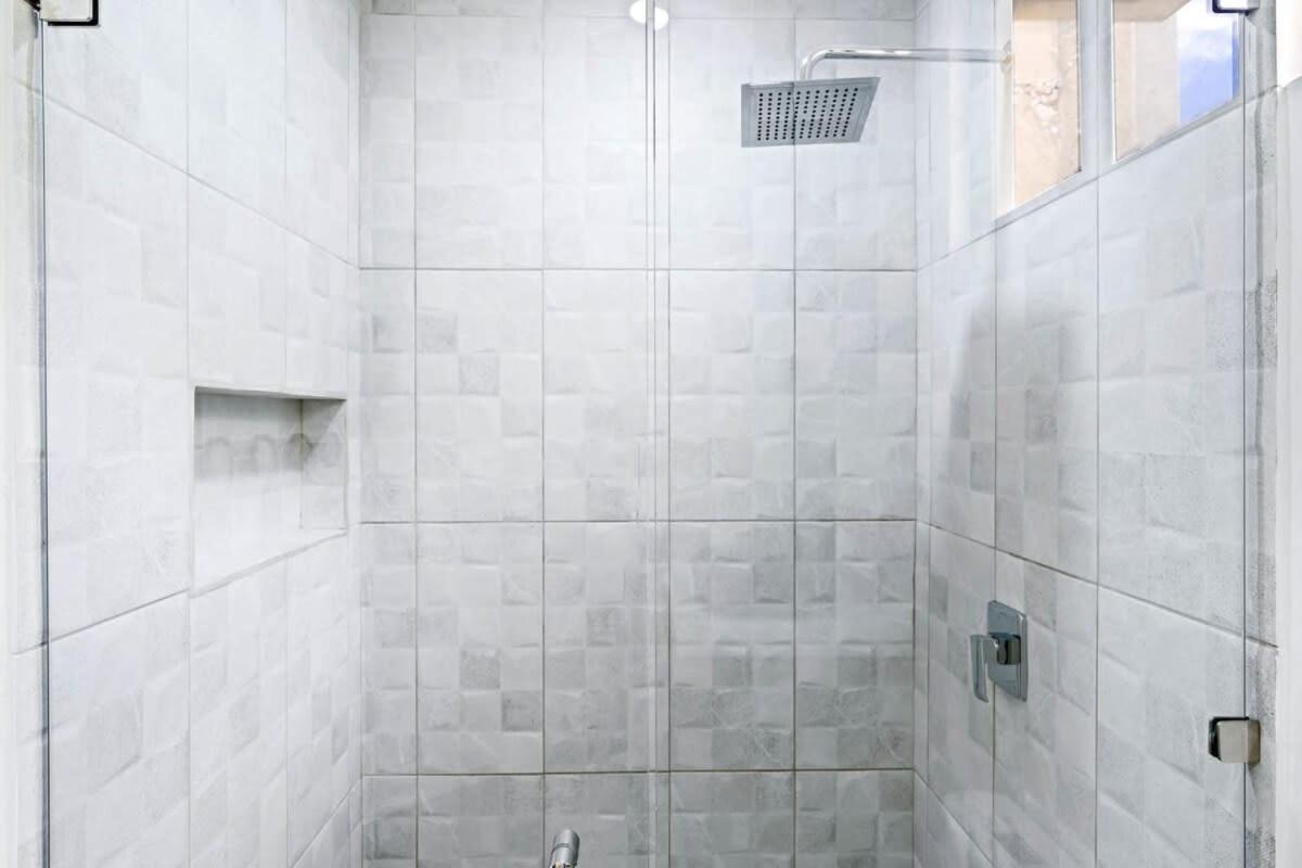 Modern Split-Level 2-Bedroom Condo with Pools, Terrace & Easy Beach Access