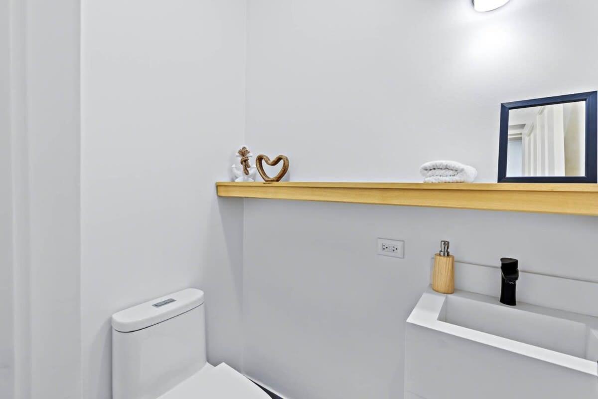 Modern Split-Level 2-Bedroom Condo with Pools, Terrace & Easy Beach Access