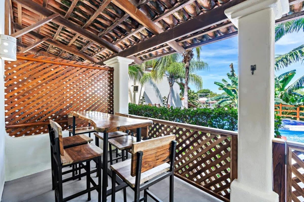 Modern Split-Level 2-Bedroom Condo with Pools, Terrace & Easy Beach Access