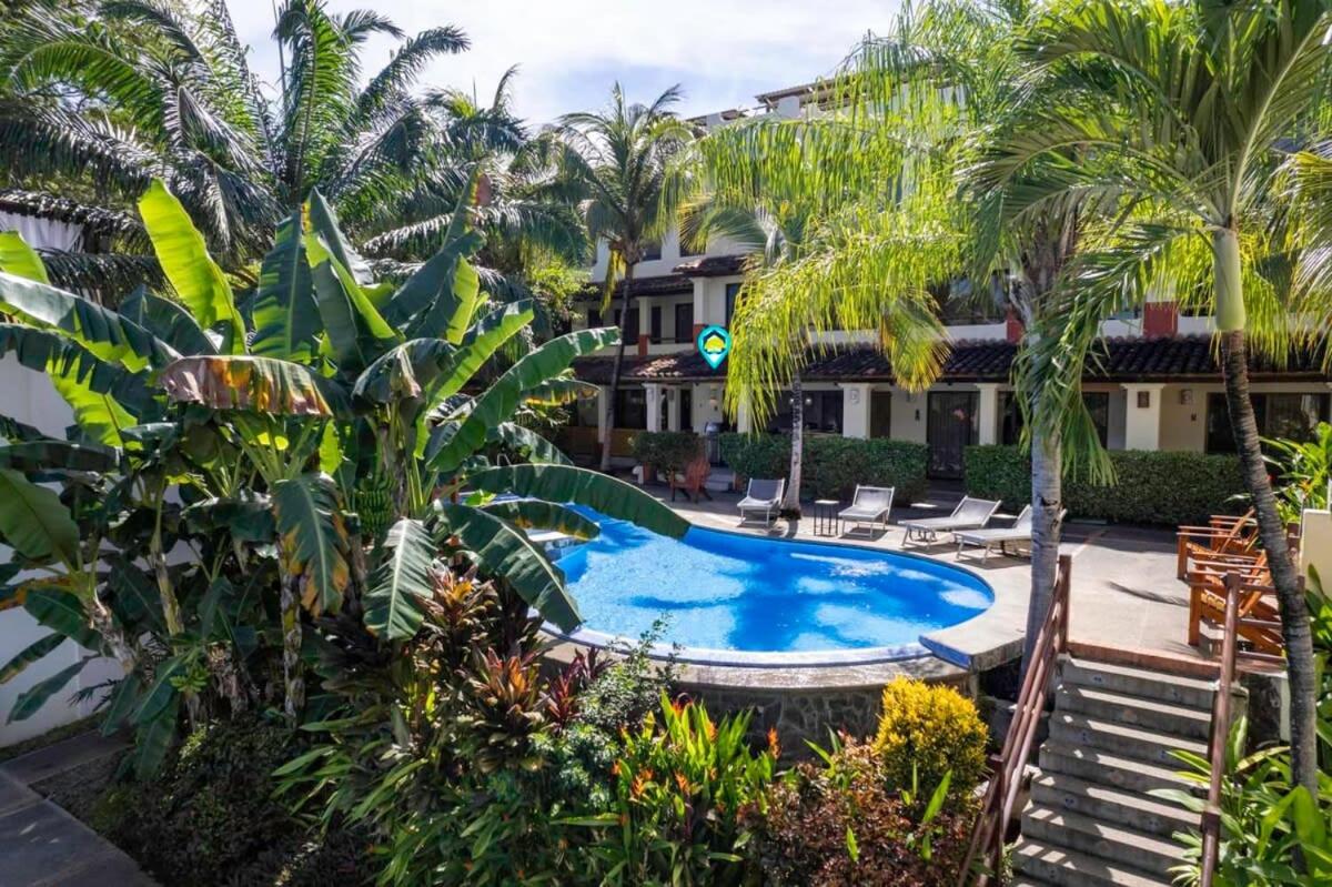 Modern Split-Level 2-Bedroom Condo with Pools, Terrace & Easy Beach Access