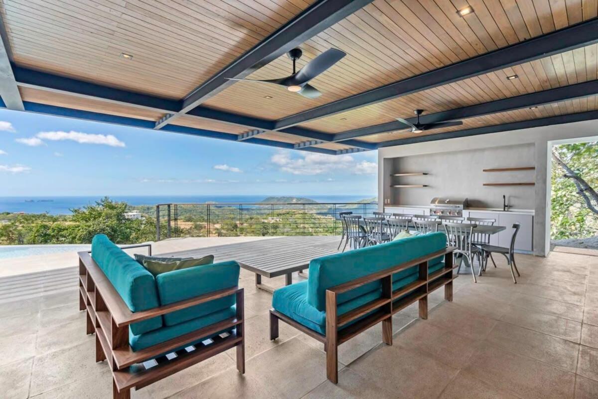 Luxurious Ultramodern Property with Private Suites, Infinity Pool, and Sweeping Ocean and Mountain Views