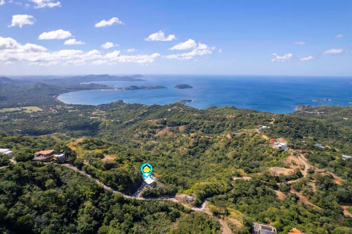 Luxurious Ultramodern Property with Private Suites, Infinity Pool, and Sweeping Ocean and Mountain Views