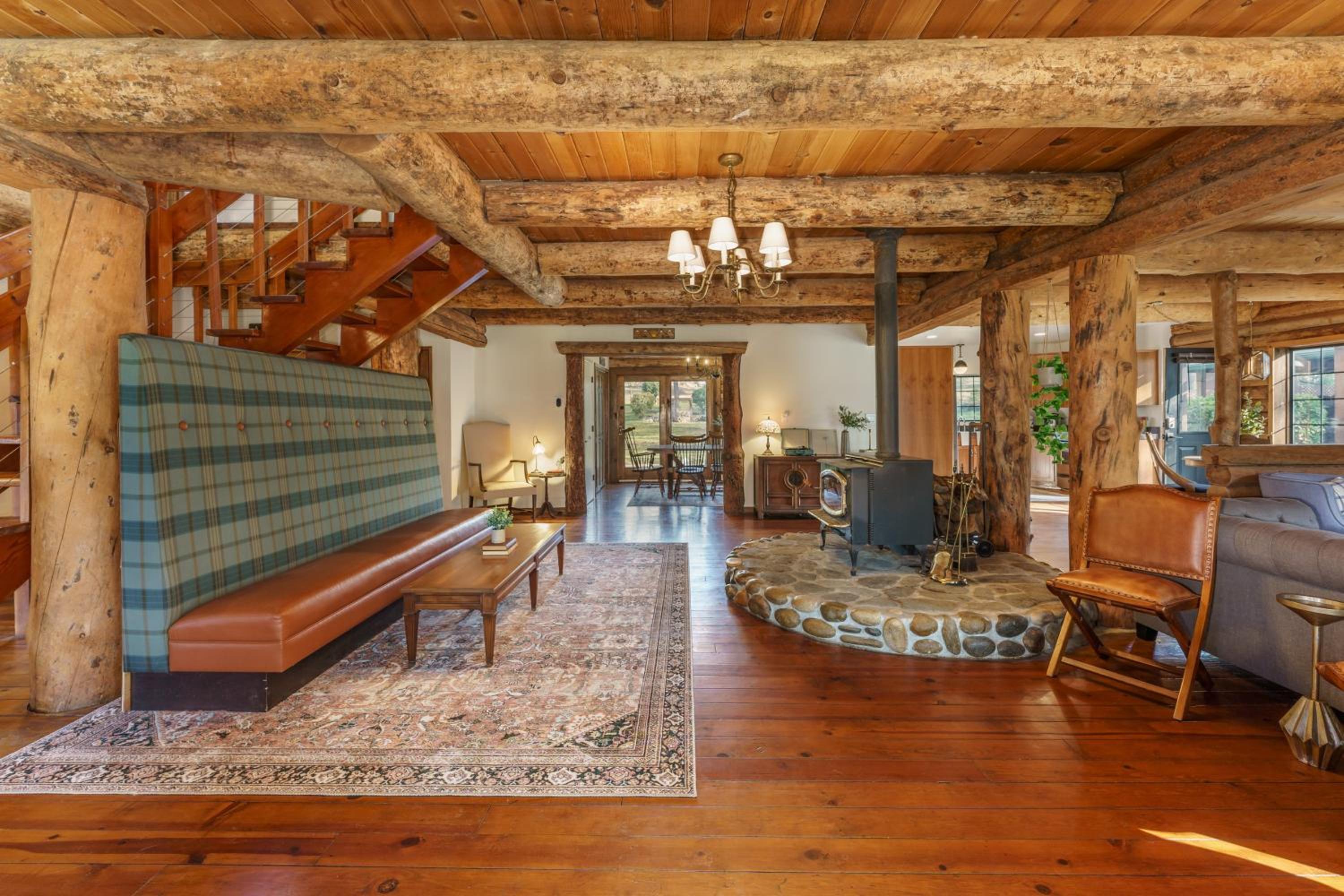 Log Cabin sleeps 20 with hot tub, EV Charger, firepit view 4