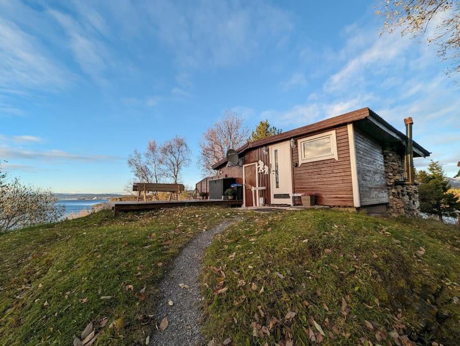 Senja - Charming cottage by the sea with terrace and fantastic view