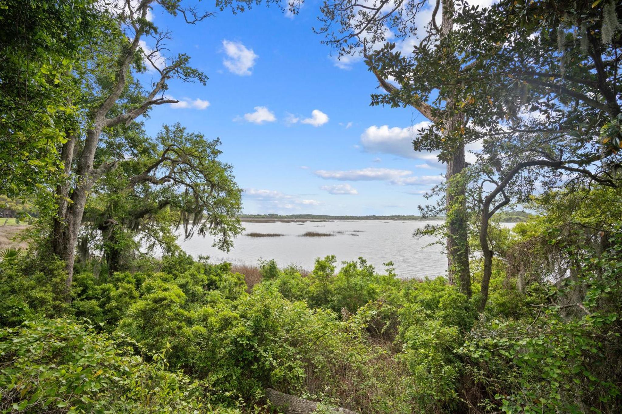 Newly Listed Bluff Villa with Creek and Golf Course Views