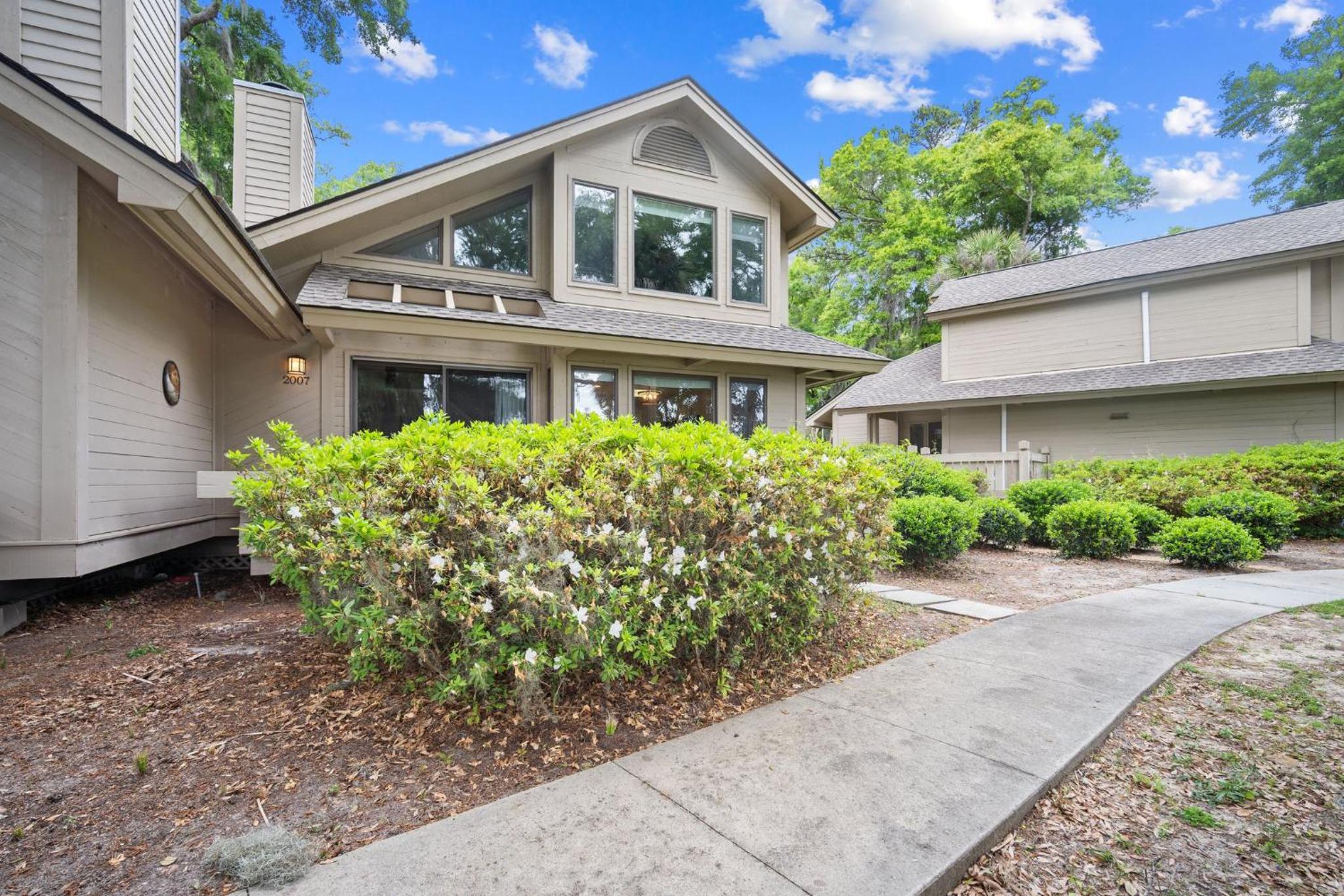 Newly Listed Bluff Villa with Creek and Golf Course Views