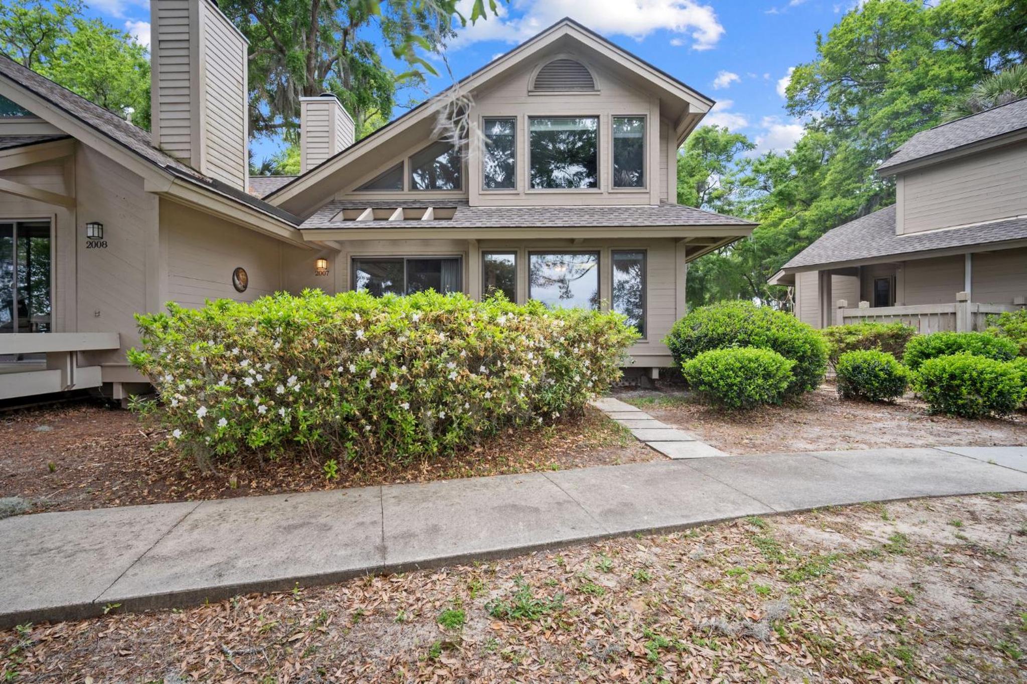 Newly Listed Bluff Villa with Creek and Golf Course Views