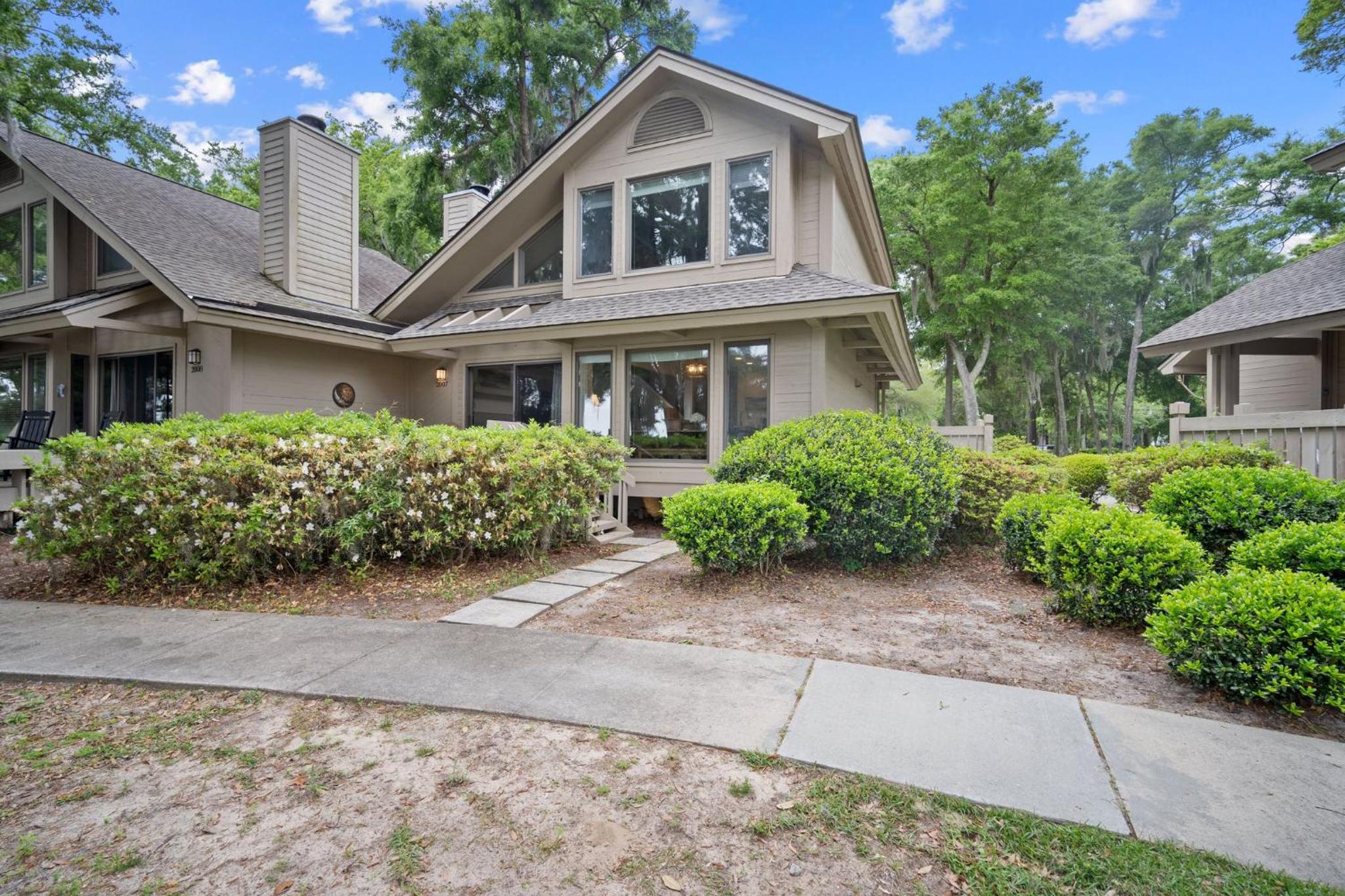 Newly Listed Bluff Villa with Creek and Golf Course Views