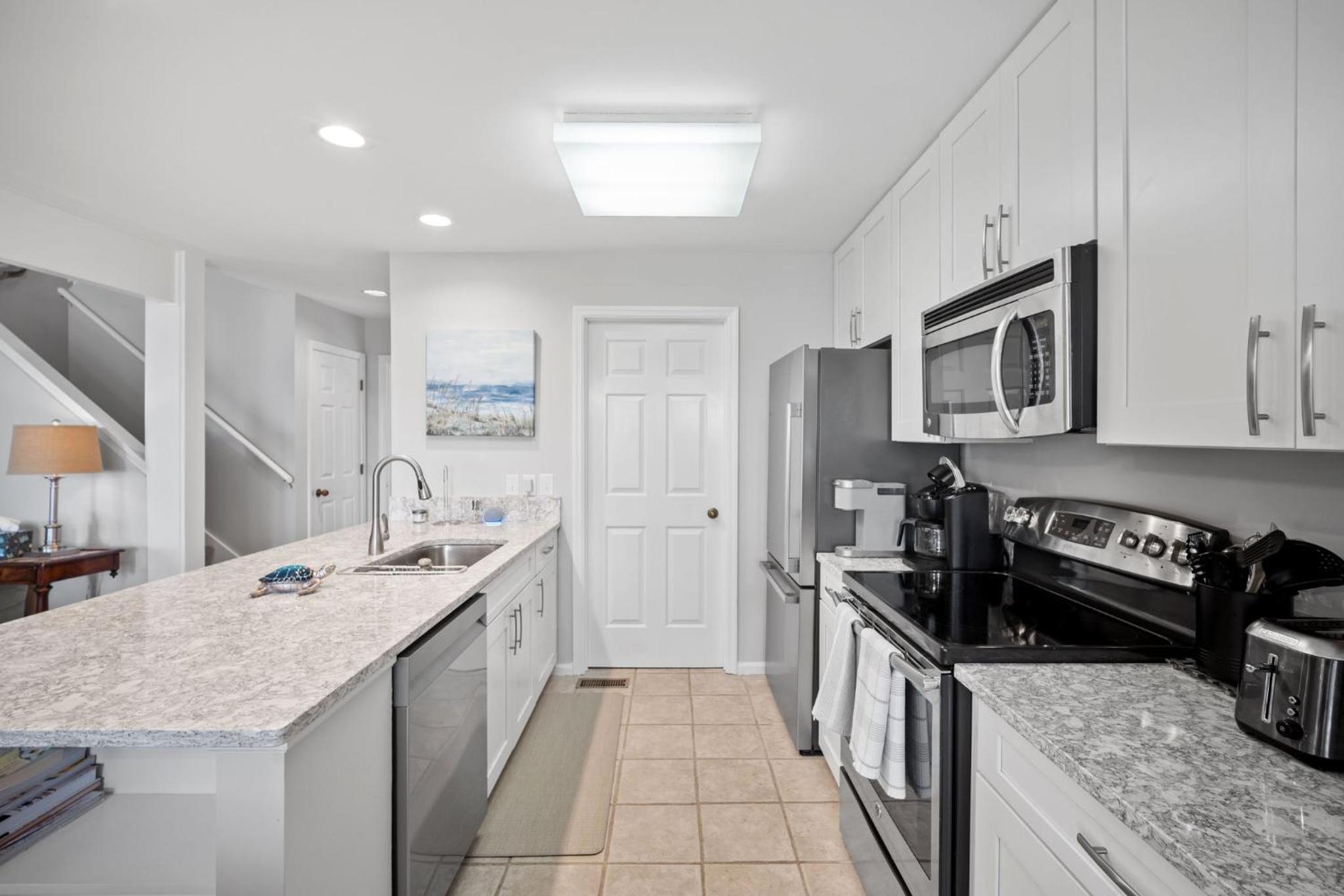 Newly Listed Bluff Villa with Creek and Golf Course Views