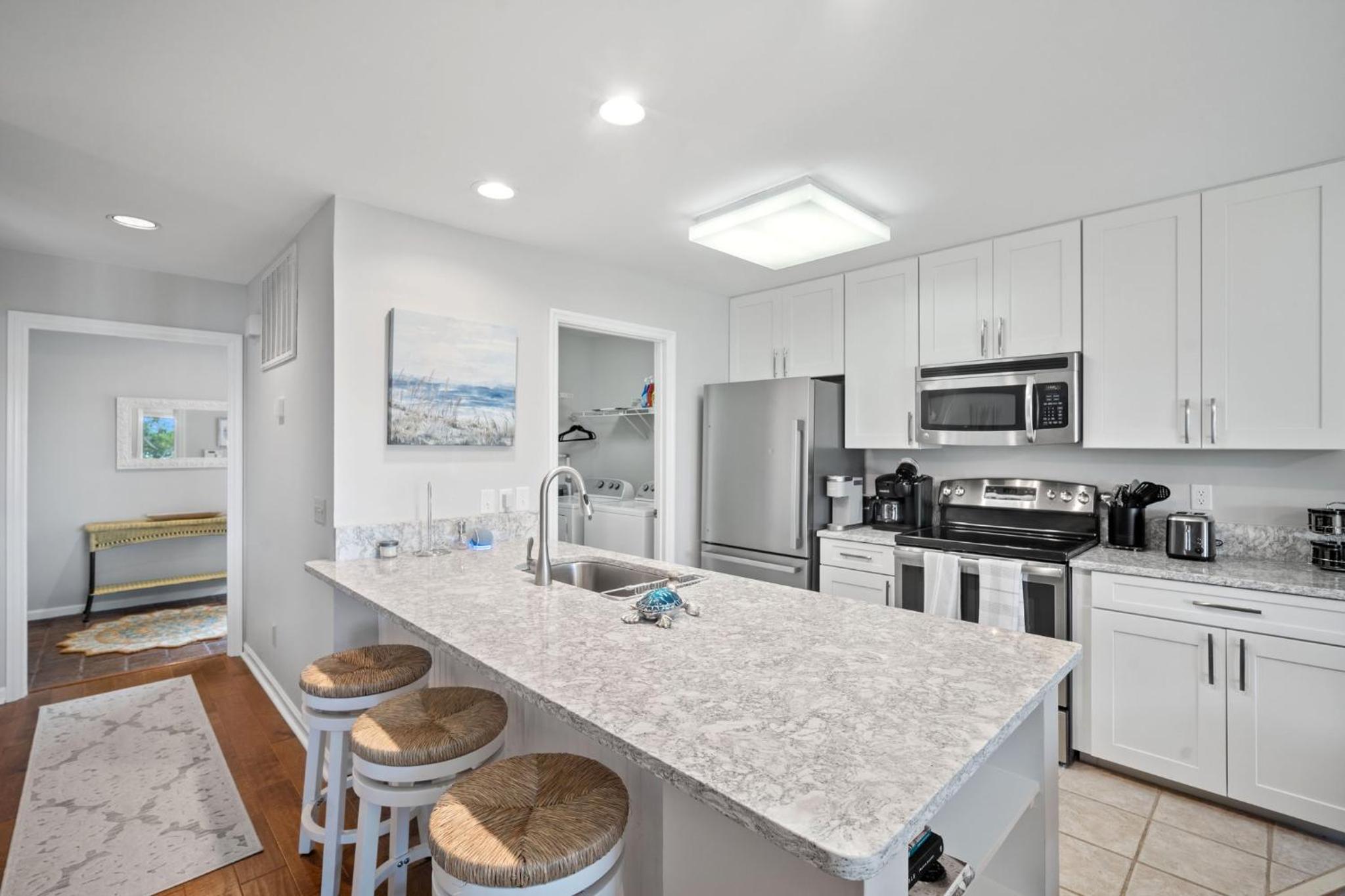 Newly Listed Bluff Villa with Creek and Golf Course Views