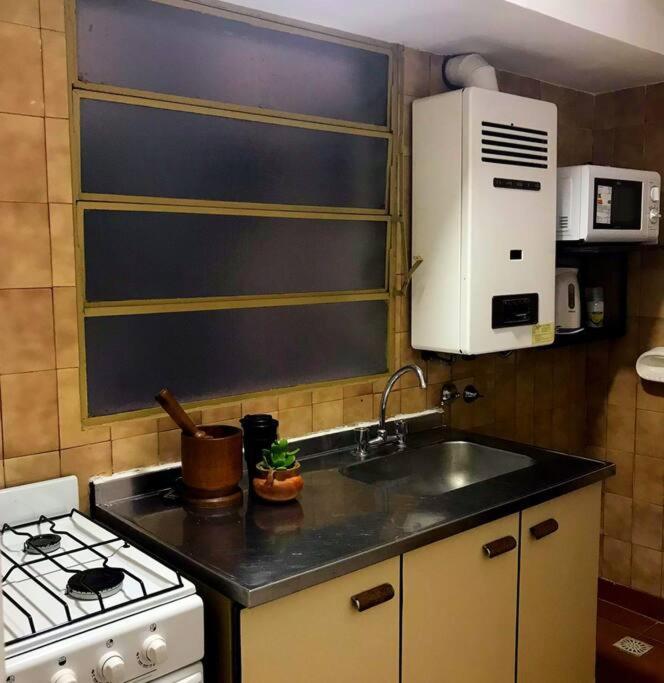 Impecable departamento céntrico.