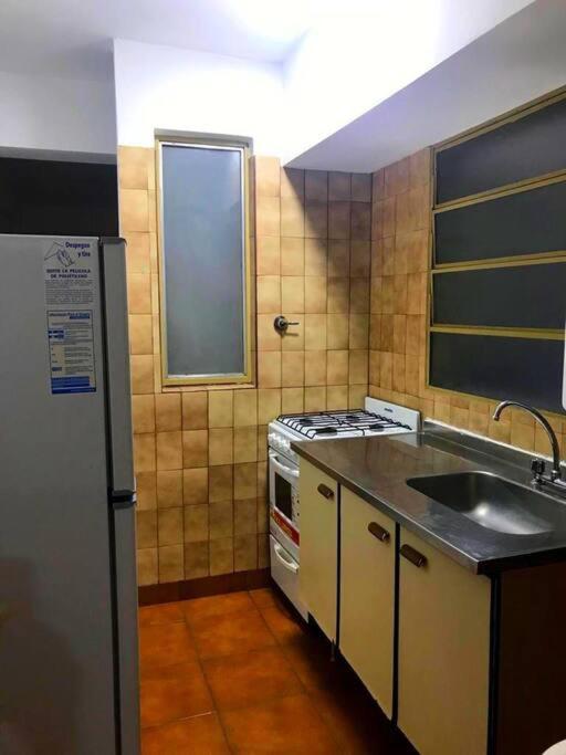 Impecable departamento céntrico.