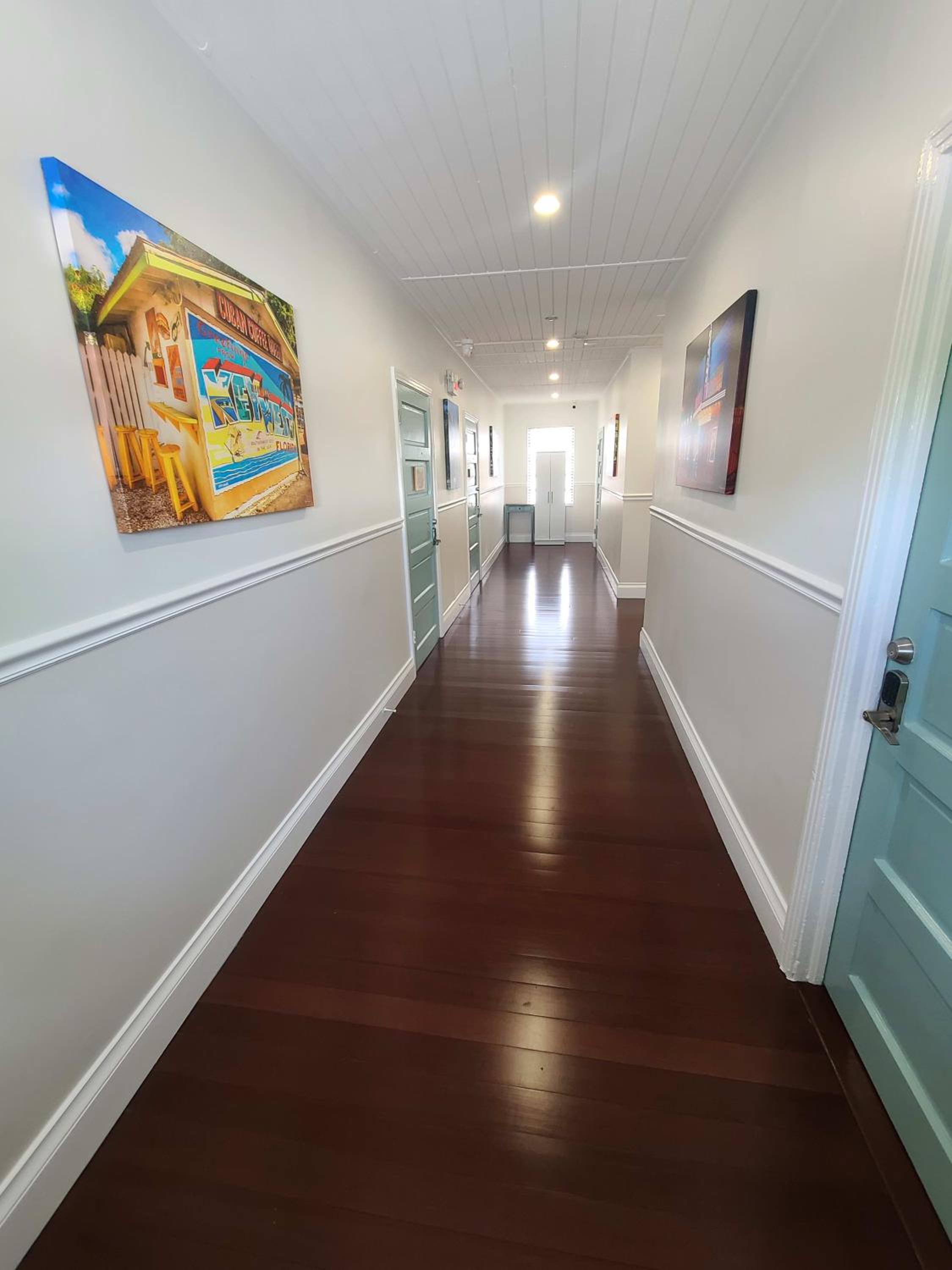 Duval Street Suite overlooking Duval with parking and pool