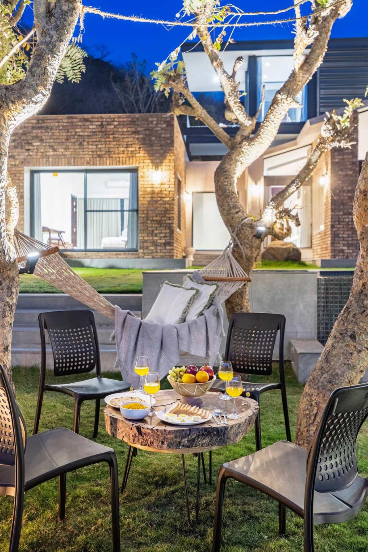 StayVista's Ikebana - Living By The Forest Edge - Mountain-view Villa with Infinity Pool, Lawn, & Indoor-Outdoor Games view 3