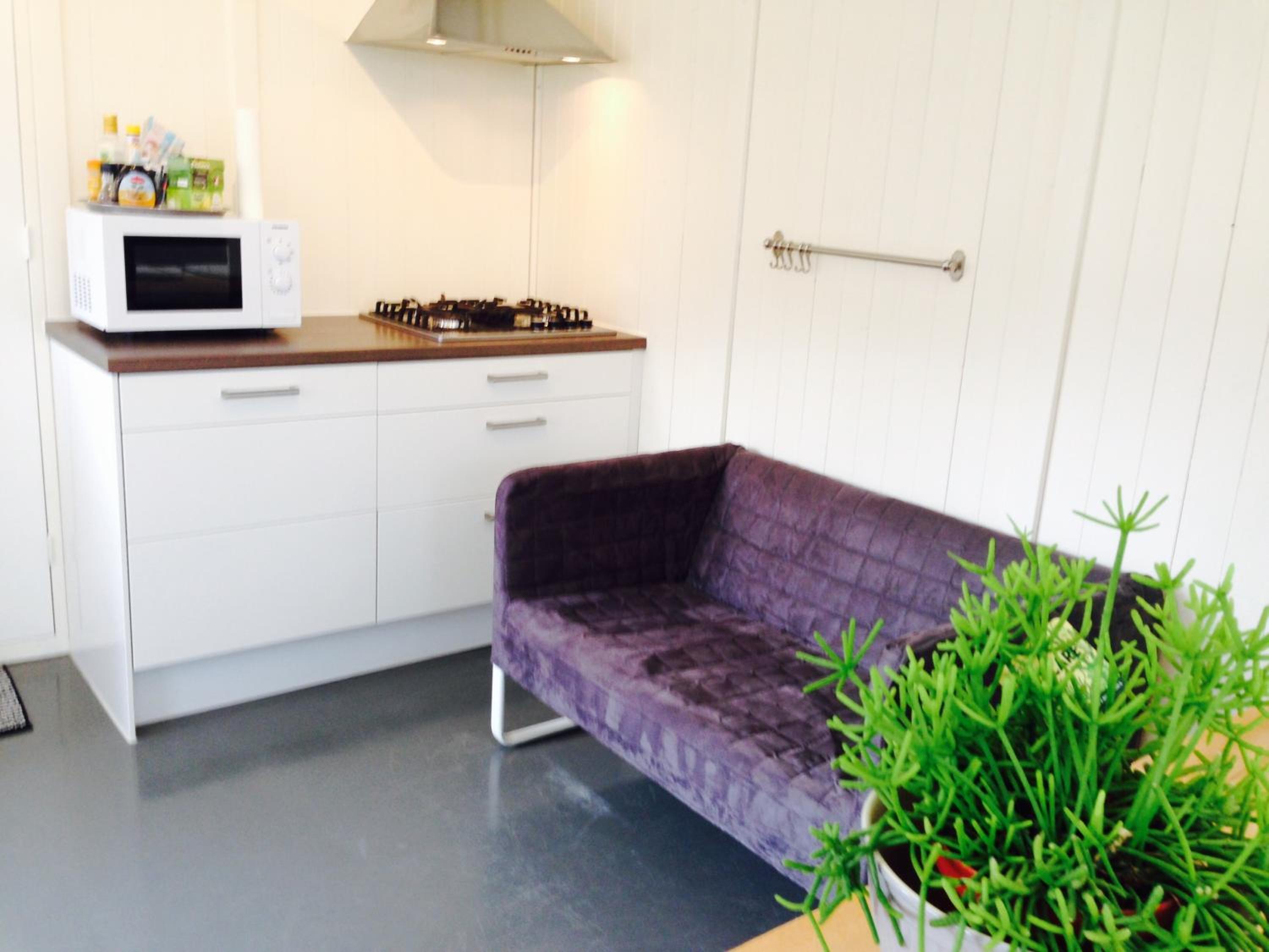 Tiny House Madame Jeanette nabij centrum en zee view 4