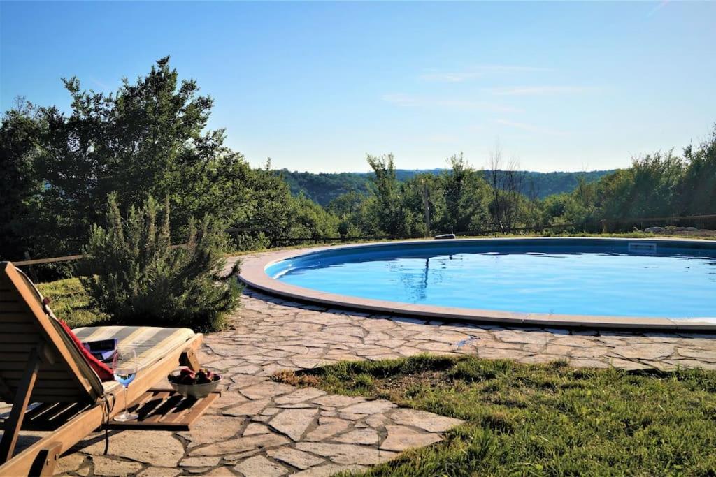 Villa Millefoglie, a century-old stone house nestled in a nature park view 2
