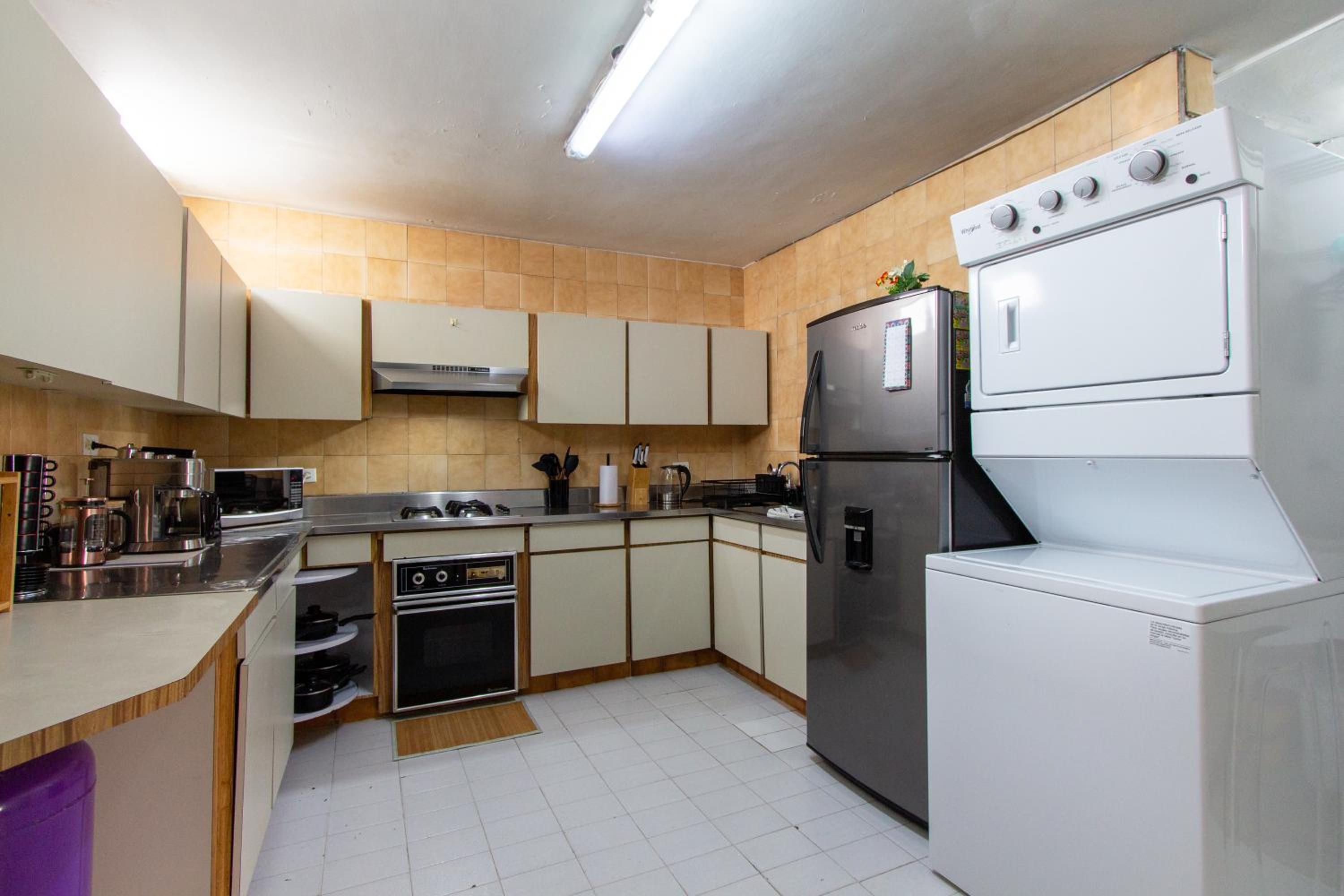CoNomad House - Coliving & Coworking