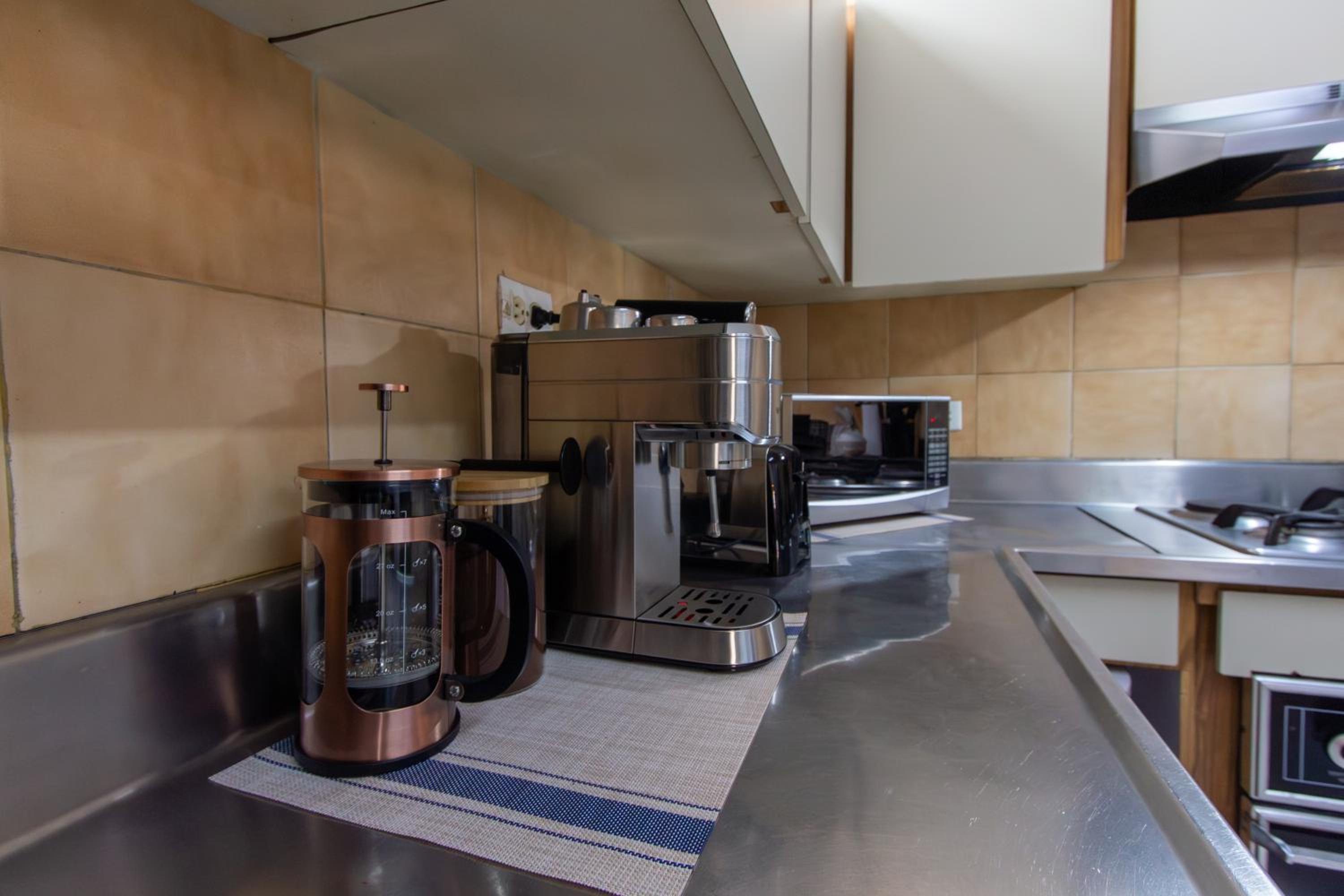CoNomad House - Coliving & Coworking