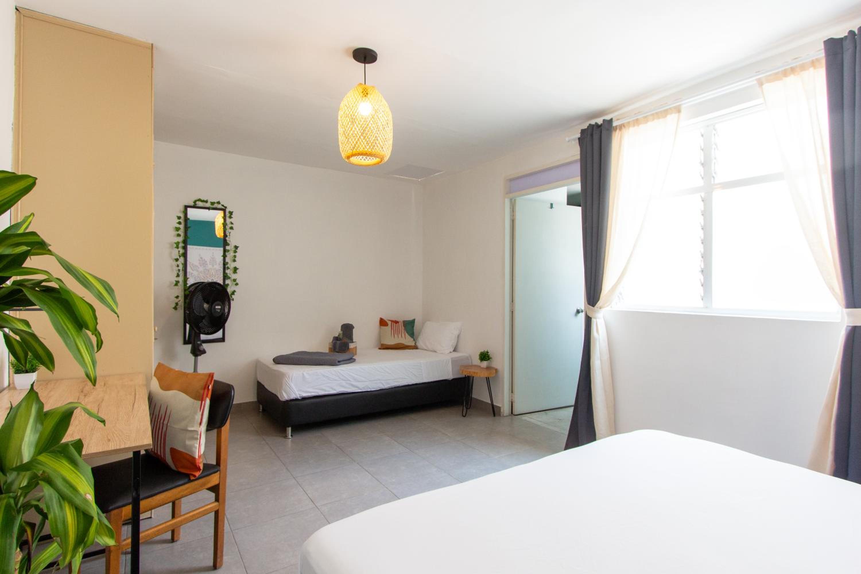CoNomad House - Coliving & Coworking