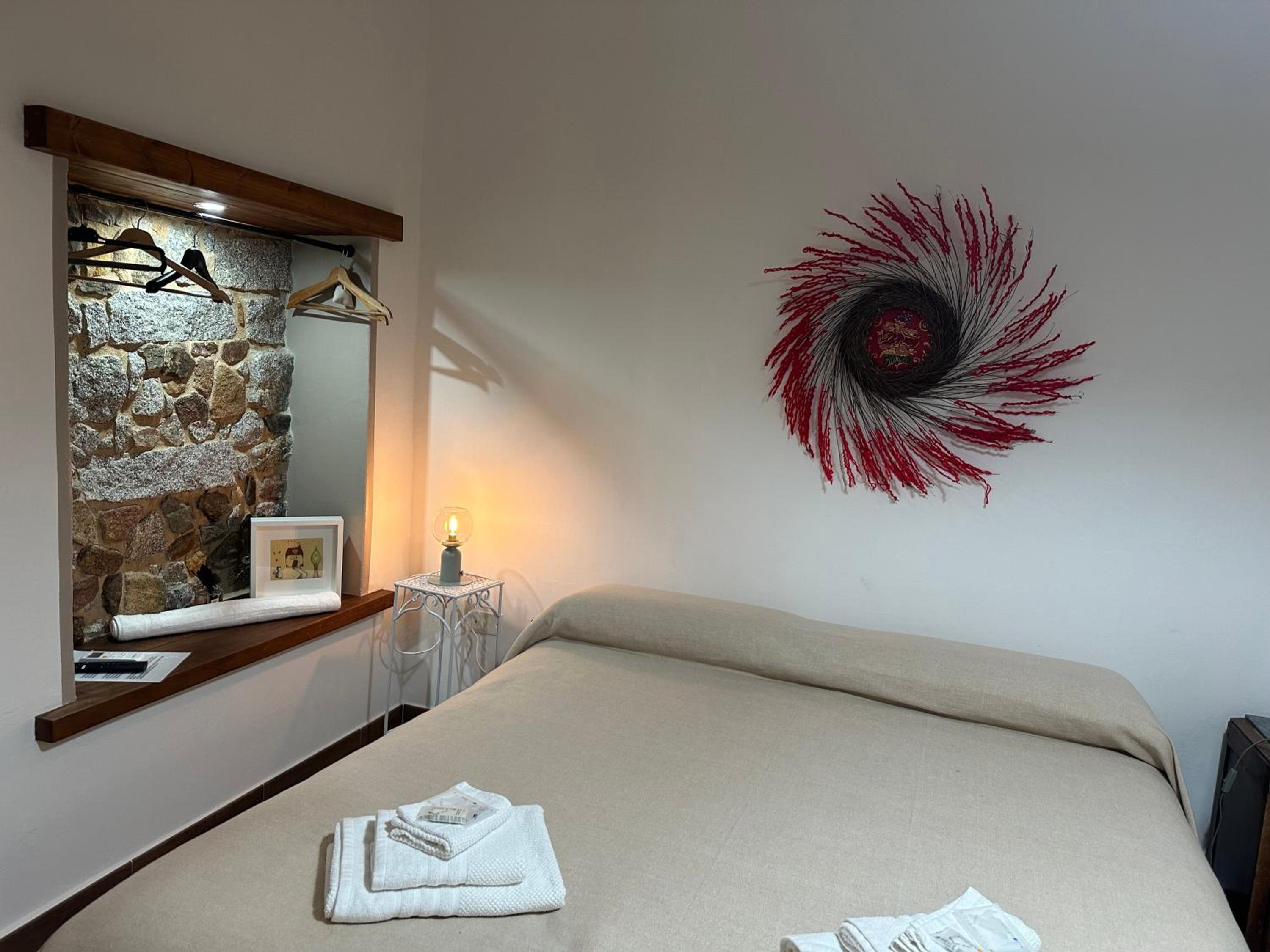 Borgo dei Centenari en Orgosolo — hotel room