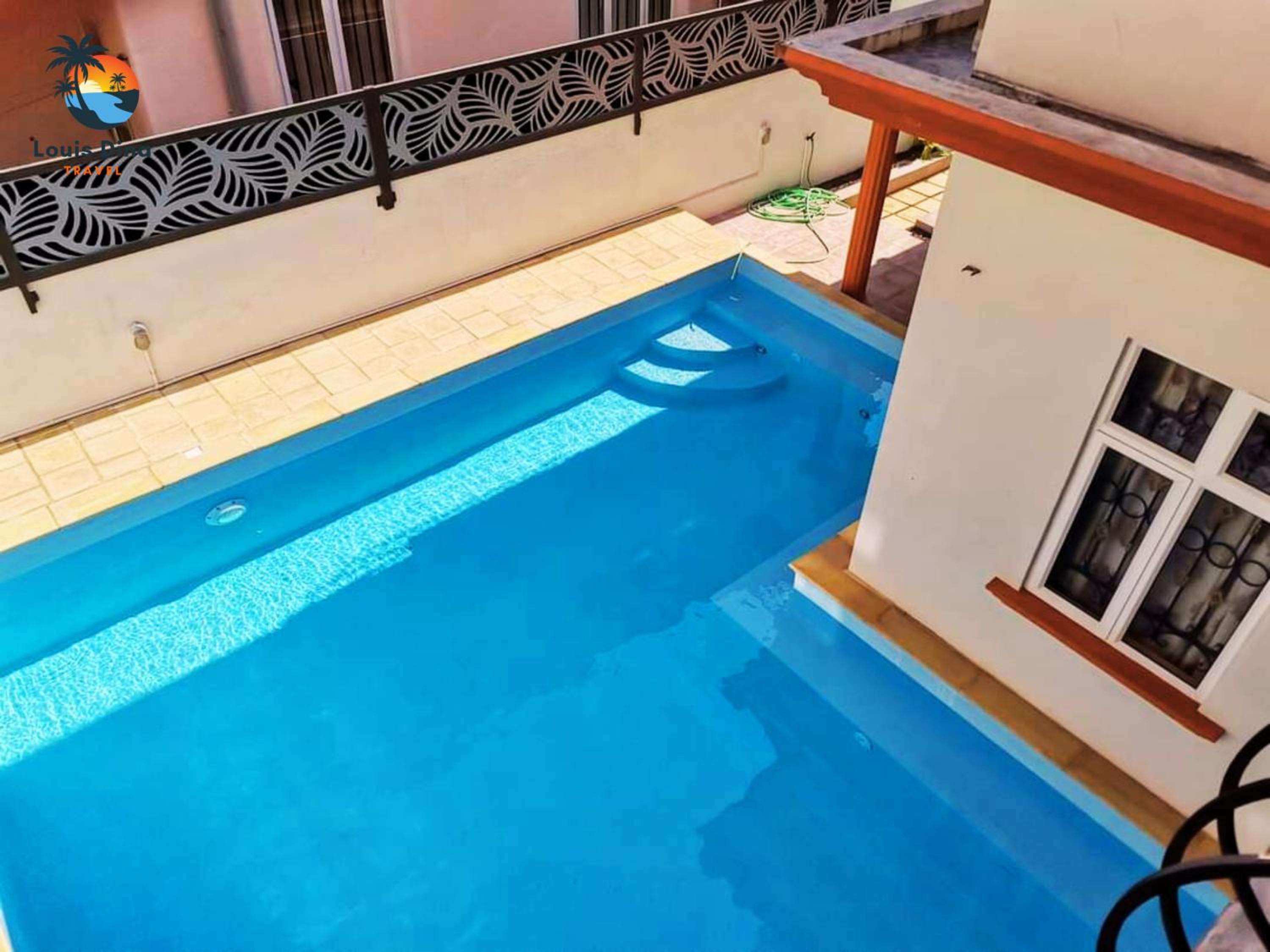 Charismatic 6-beds private spacious family villa with private big pool near beach flic en flac view 5