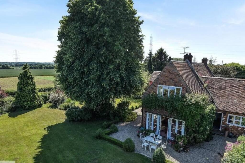 Old school house surrounded by countryside view 5
