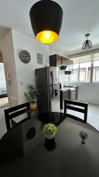 Cozy fully equipped apartment. 12 min from Fexco