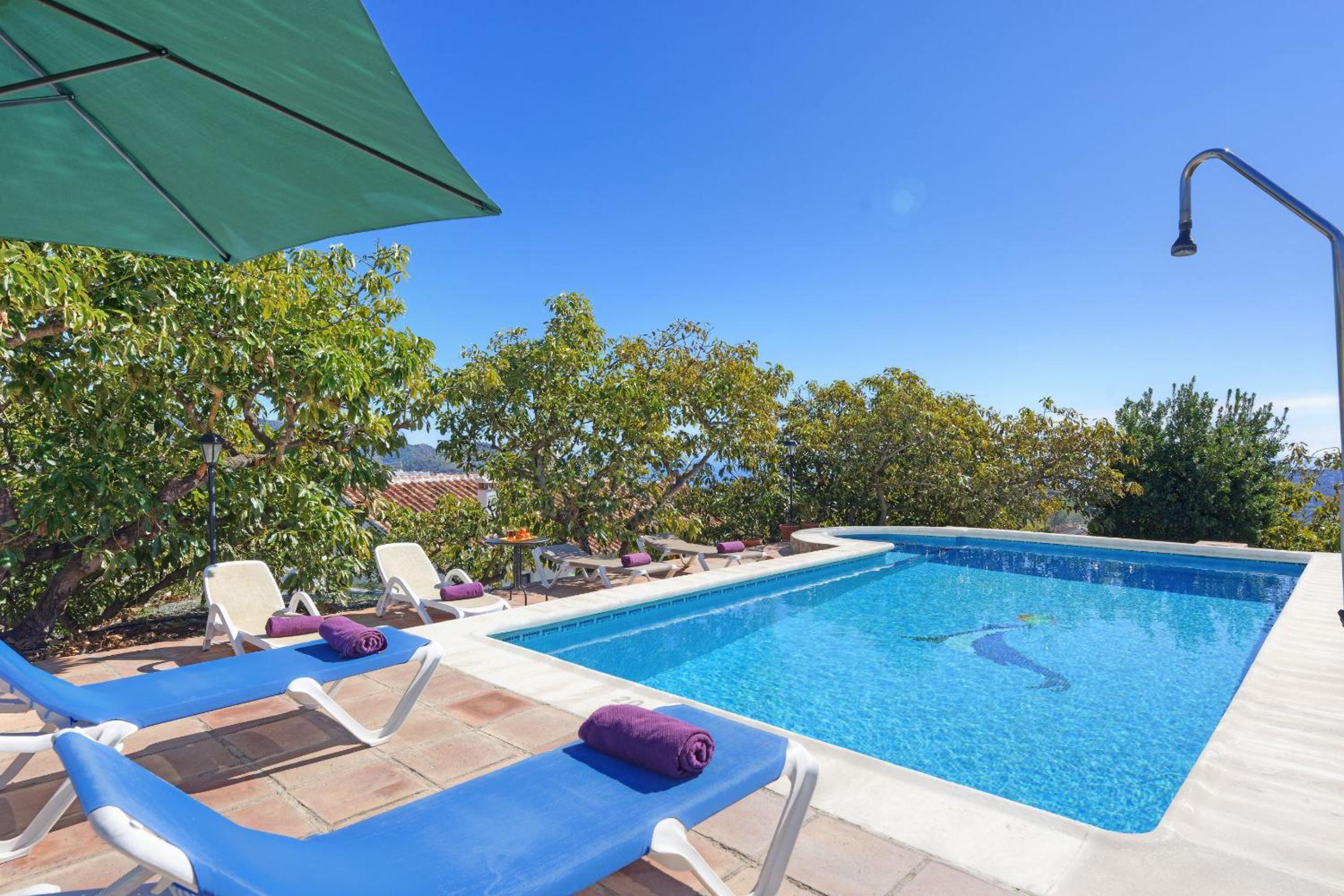 The Strawberry Villa private pool garden views