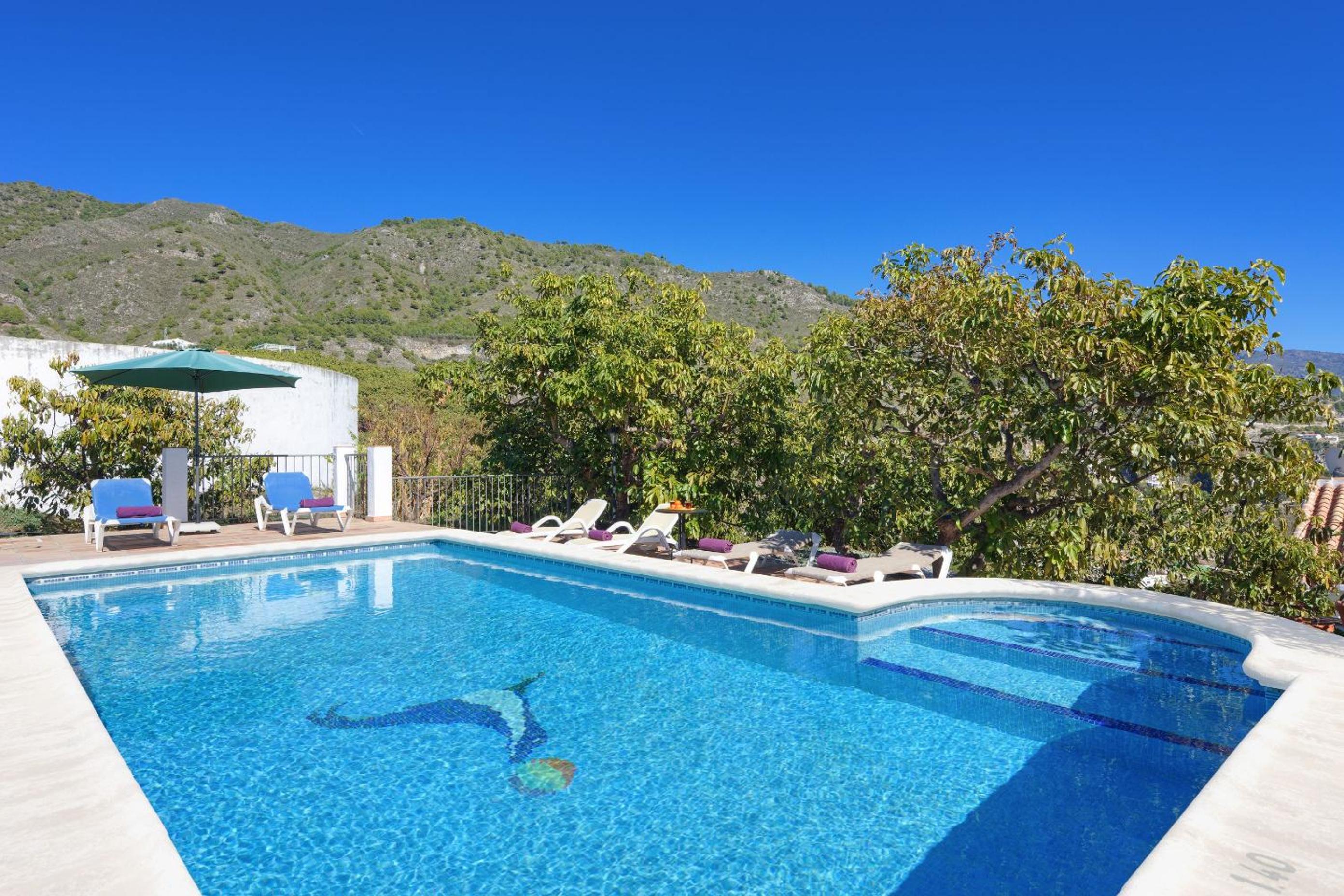 The Strawberry Villa private pool garden views