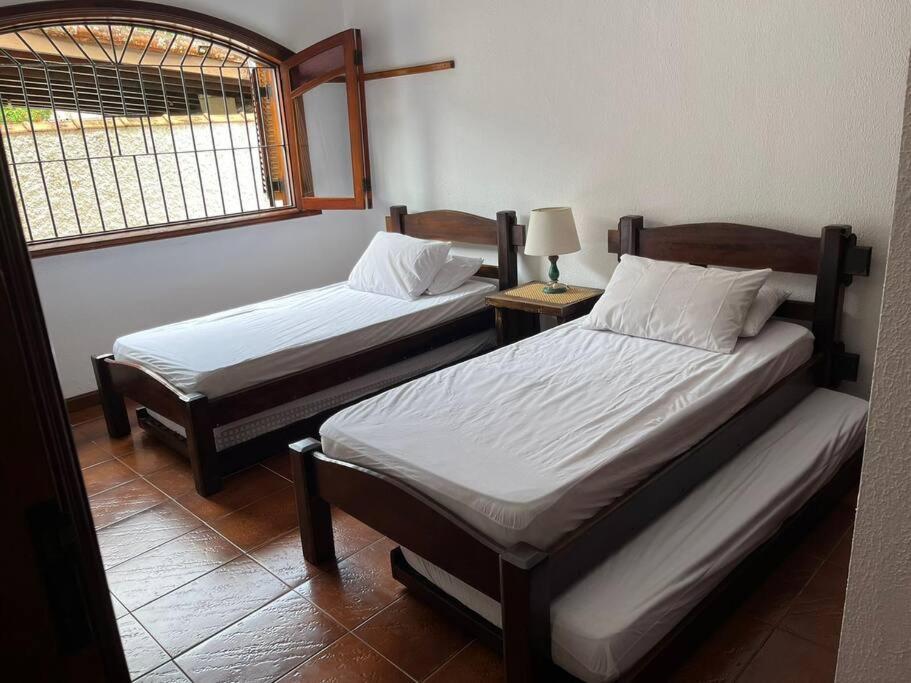Casa 30 m da praia,condomínio Tenório